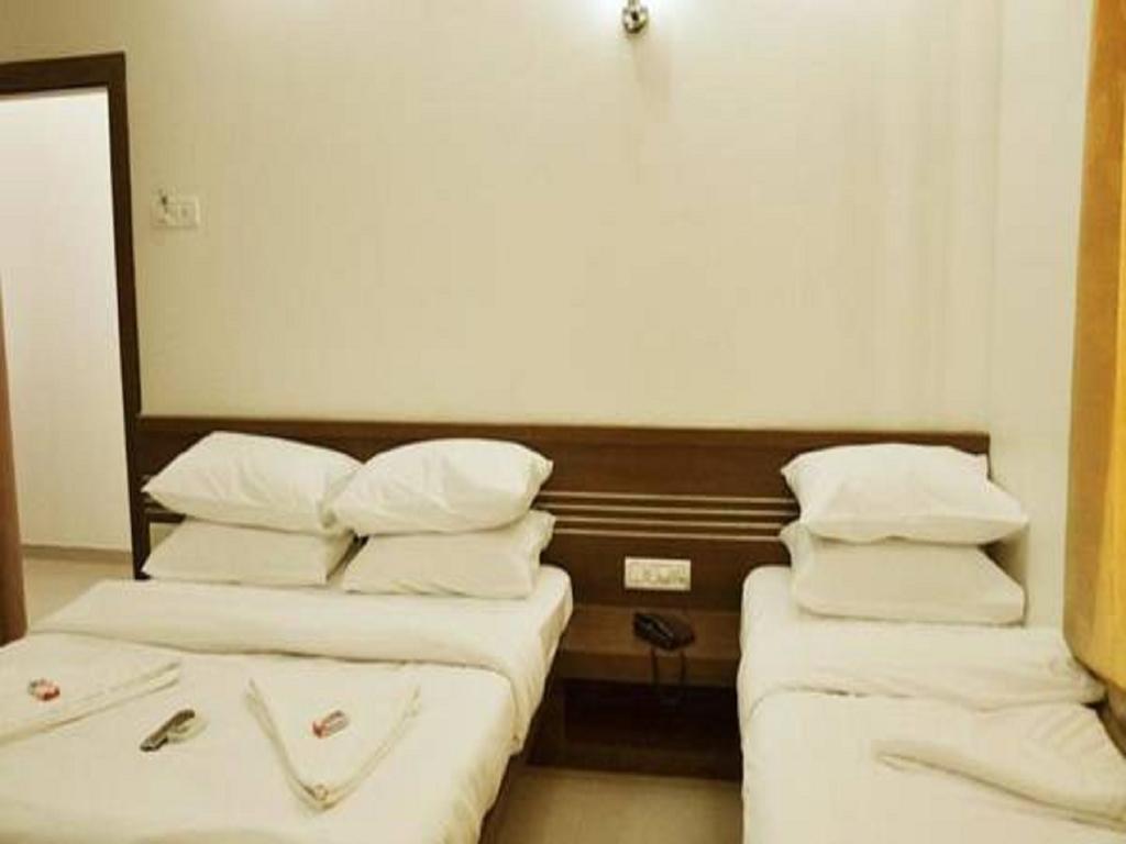 Hotel Airport Land Nova Deli Quarto foto